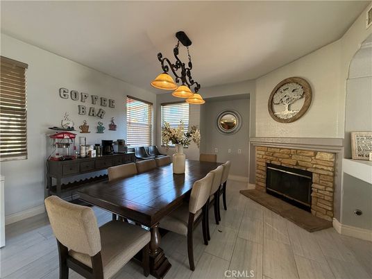 Dining room, Fireplace, Interior, Pendant Lights, Wood Texture Flooring