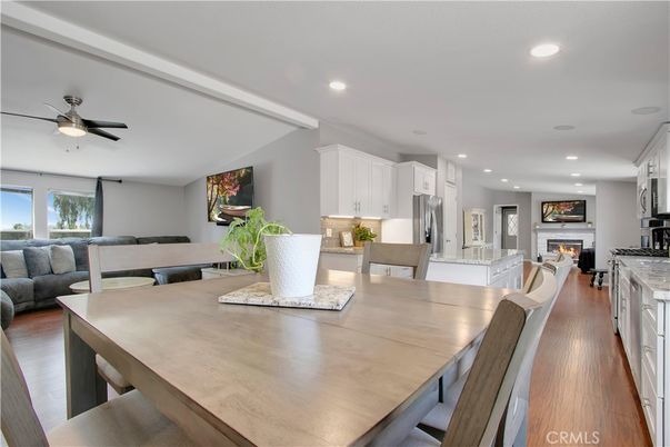Dining room, Fireplace, Interior, Kitchen, Living room, Recessed Lighting, Wood Texture Flooring