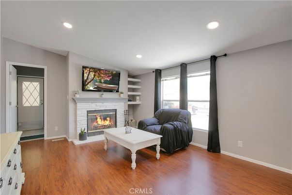 Fireplace, Interior, Living room, Recessed Lighting, Wood Texture Flooring