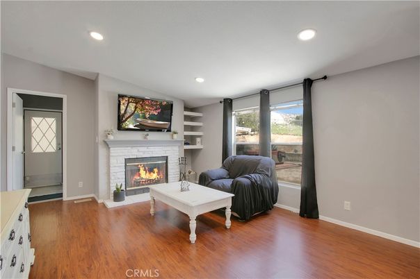 Fireplace, Interior, Living room, Recessed Lighting, Wood Texture Flooring