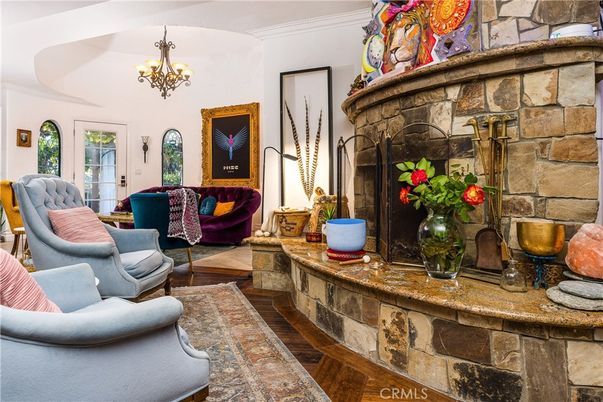 Chandelier, Fireplace, Interior, Living room, Stone Walls, Wood Texture Flooring