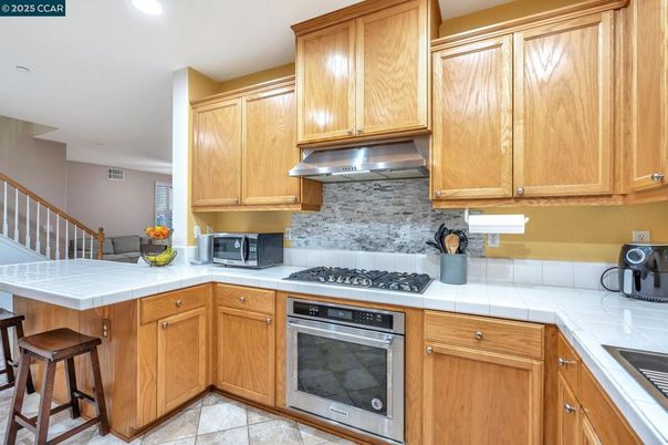 Interior, Kitchen, Recessed Lighting, Tile Countertops