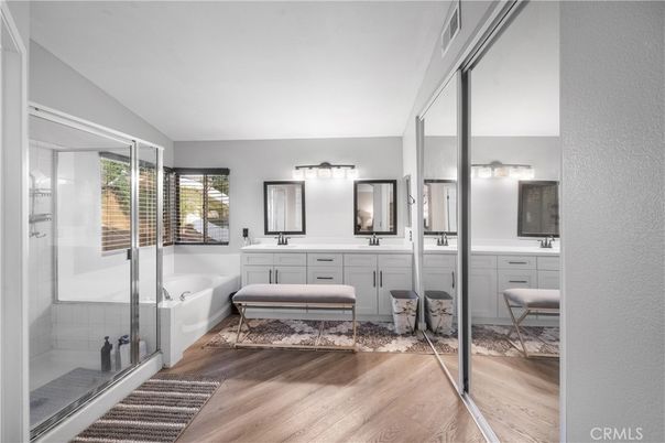 Bathroom, Dual Sink Vanities, Glass Shower, Interior, Wood Texture Flooring