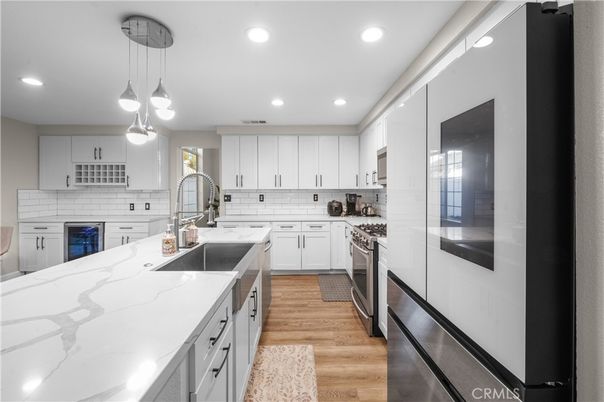 Interior, Kitchen, Pendant Lights, Recessed Lighting, Stainless Steel Appliances, Wood Texture Flooring