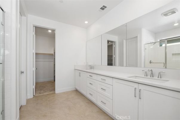 Bathroom, Dual Sink Vanities, Glass Shower, Interior, Recessed Lighting, Walk-in Closets