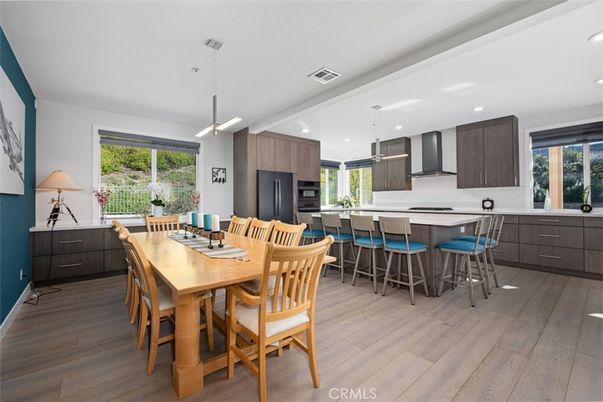 Dining room, Interior, Kitchen, Pendant Lights, Recessed Lighting, Stainless Steel Appliances, Wood Texture Flooring