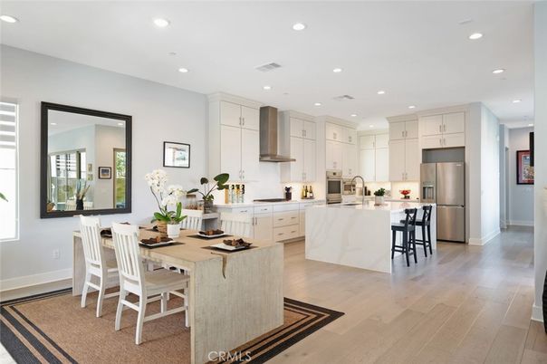 Dining room, Interior, Kitchen, Recessed Lighting, Stainless Steel Appliances, Wood Texture Flooring