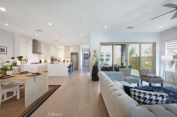 Dining room, Interior, Kitchen, Living room, Recessed Lighting, Stainless Steel Appliances, Wood Texture Flooring