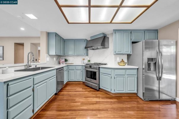 Interior, Kitchen, Recessed Lighting, Stainless Steel Appliances, Wood Texture Flooring