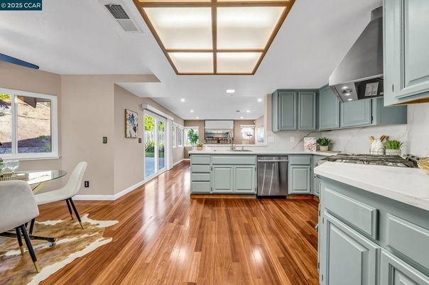 Dining room, Interior, Kitchen, Recessed Lighting, Stainless Steel Appliances, Wood Texture Flooring