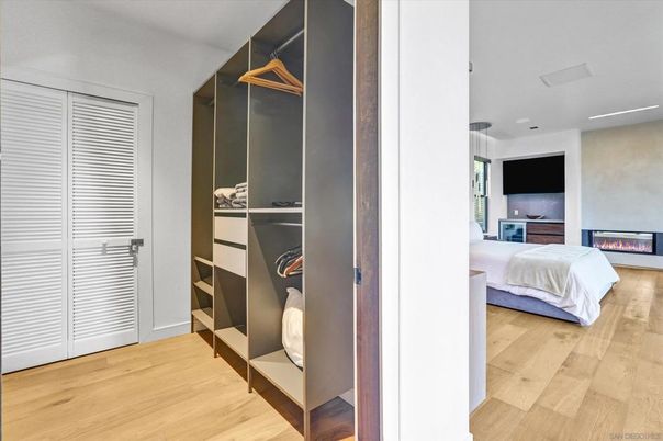 Bedroom, Fireplace, Interior, Recessed Lighting, Wood Texture Flooring