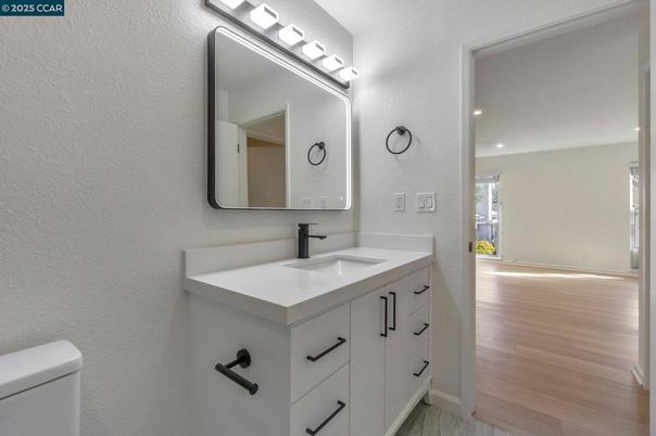 Bathroom, Dual Sink Vanities, Interior, Recessed Lighting, Wood Texture Flooring