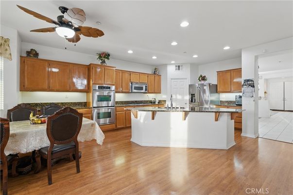 Dining room, Interior, Kitchen, Recessed Lighting, Stainless Steel Appliances, Wood Texture Flooring