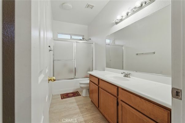 Bathroom, Dual Sink Vanities, Glass Shower, Interior, Wood Texture Flooring