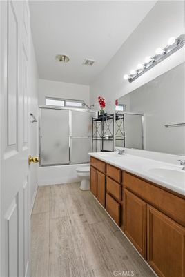 Bathroom, Dual Sink Vanities, Glass Shower, Interior, Wood Texture Flooring