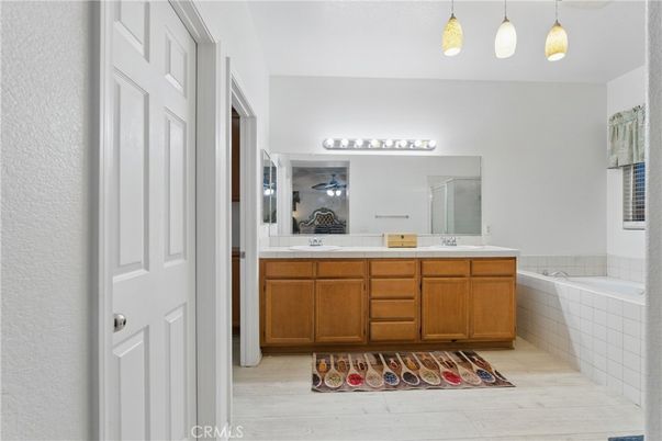 Bathroom, Dual Sink Vanities, Interior, Pendant Lights, Wood Texture Flooring