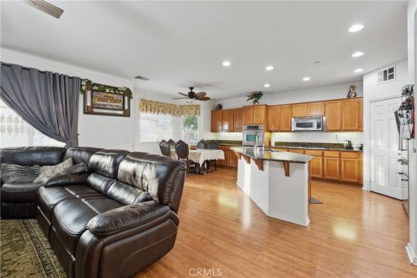 Dining room, Interior, Kitchen, Living room, Recessed Lighting, Stainless Steel Appliances, Wood Texture Flooring