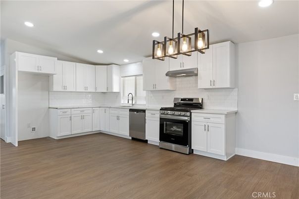 Interior, Kitchen, Pendant Lights, Recessed Lighting, Stainless Steel Appliances, Wood Texture Flooring