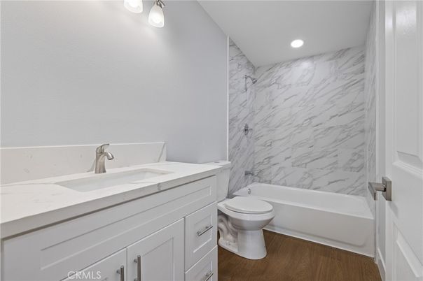 Bathroom, Interior, Marble Walls, Recessed Lighting, Wood Texture Flooring