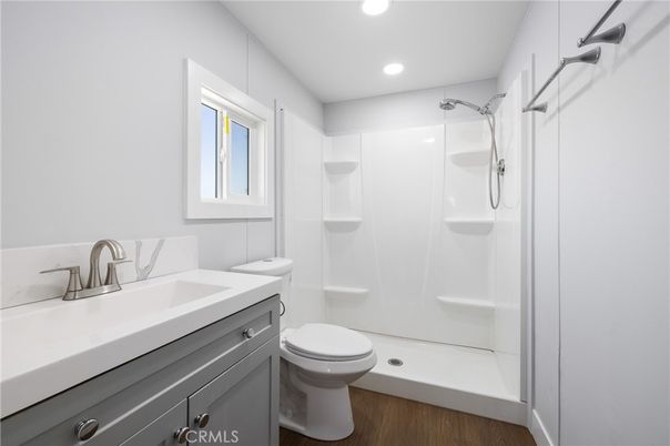 Bathroom, Glass Shower, Interior, Recessed Lighting, Wood Texture Flooring