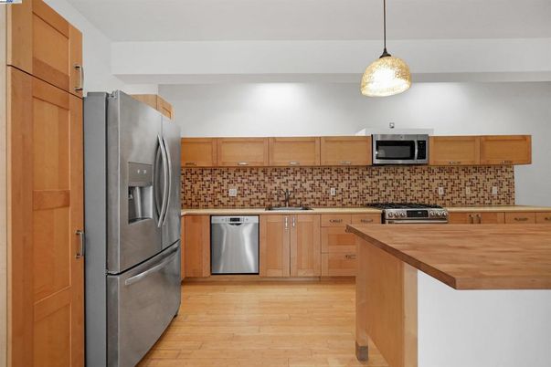 Interior, Kitchen, Pendant Lights, Stainless Steel Appliances, Wood Texture Flooring