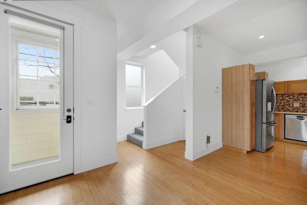 Interior, Kitchen, Recessed Lighting, Stainless Steel Appliances, Washer, Wood Texture Flooring