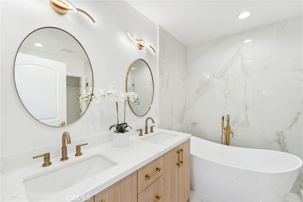 Bathroom, Dual Sink Vanities, Free Standing Baths, Interior, Marble Walls, Recessed Lighting