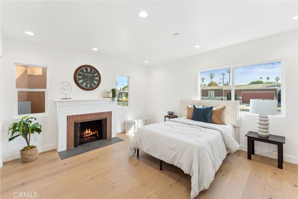 Bedroom, Fireplace, Interior, Recessed Lighting, Wood Texture Flooring