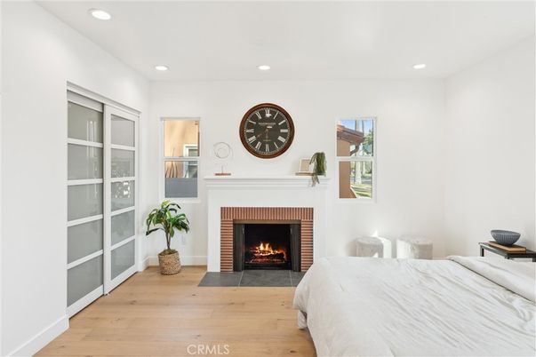 Bedroom, Fireplace, Interior, Recessed Lighting, Wood Texture Flooring