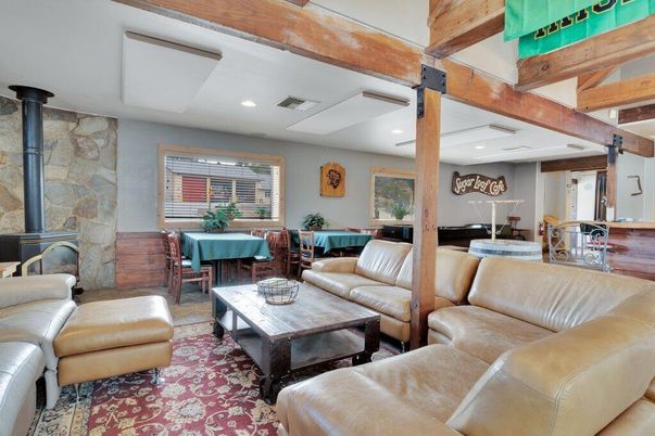 Dining room, Fireplace, Interior, Living room, Recessed Lighting, Stone Walls, Wooden Beams, Wood Texture Flooring