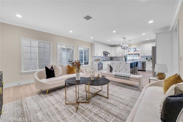 Chandelier, Interior, Kitchen, Living room, Marble Walls, Recessed Lighting, Stainless Steel Appliances, Wood Texture Flooring