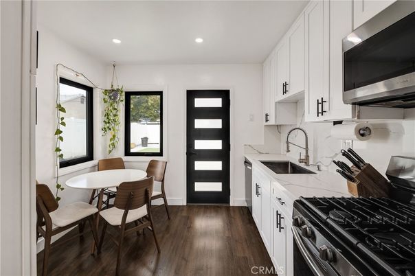 Dining room, Interior, Kitchen, Recessed Lighting, Stainless Steel Appliances, Wood Texture Flooring