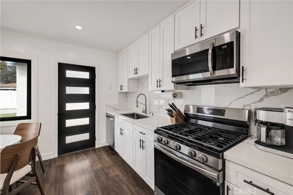 Interior, Kitchen, Recessed Lighting, Stainless Steel Appliances, Wood Texture Flooring