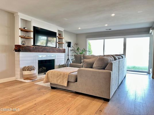 Fireplace, Interior, Living room, Recessed Lighting, Wood Texture Flooring