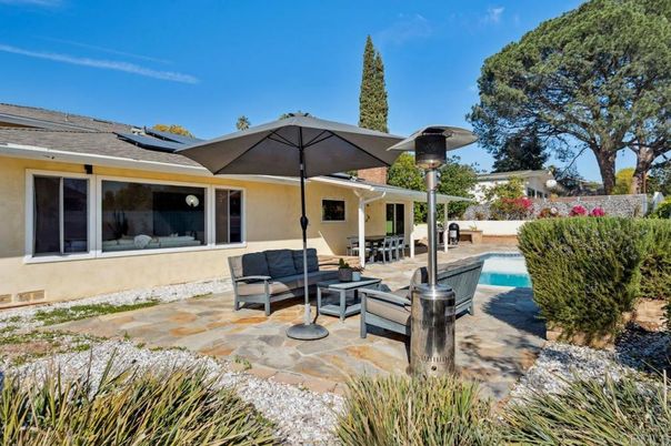 Exterior, Pool, Solar Panels