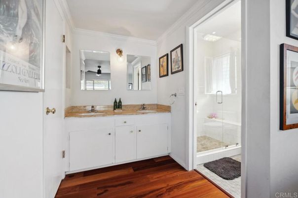 Bathroom, Dual Sink Vanities, Glass Shower, Interior, Wood Texture Flooring