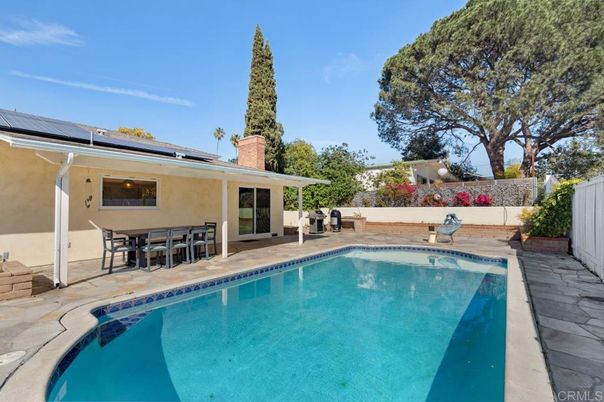 Exterior, Pool, Solar Panels