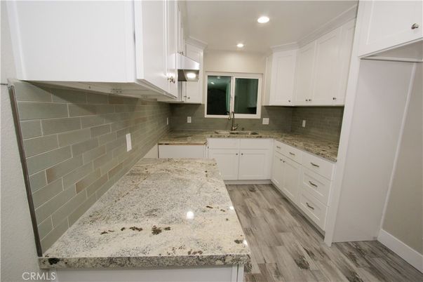 Interior, Kitchen, Recessed Lighting, Stone Walls, Wood Texture Flooring