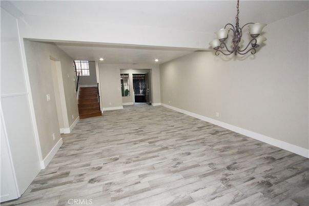 Chandelier, Empty room, Interior, Recessed Lighting, Wood Texture Flooring