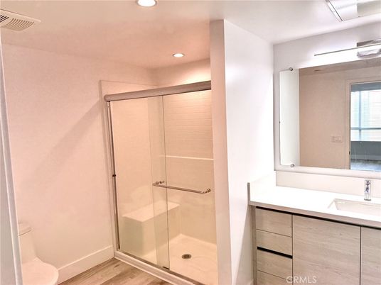 Bathroom, Glass Shower, Interior, Recessed Lighting, Wood Texture Flooring