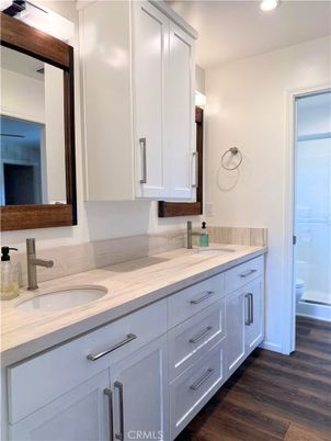 Bathroom, Dual Sink Vanities, Interior, Recessed Lighting, Wood Texture Flooring
