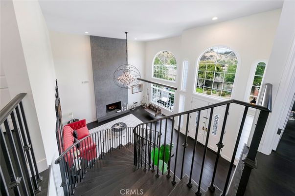 Chandelier, Fireplace, Interior, Recessed Lighting, Wood Texture Flooring