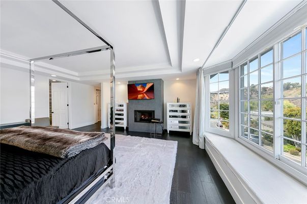 Bedroom, Fireplace, Interior, Recessed Lighting, Wood Texture Flooring