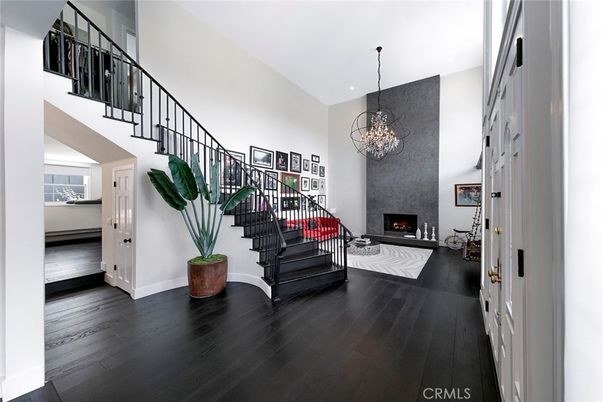 Chandelier, Fireplace, Interior, Living room, Recessed Lighting, Wood Texture Flooring
