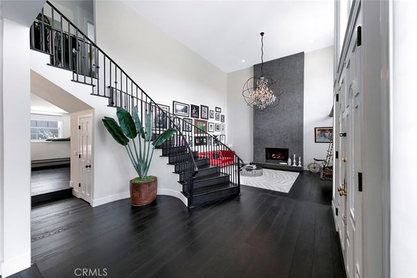 Chandelier, Fireplace, Interior, Living room, Recessed Lighting, Wood Texture Flooring