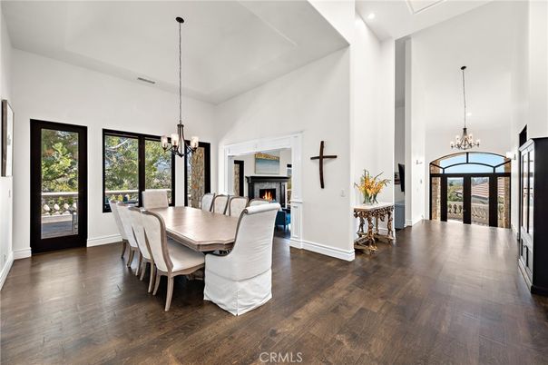 Chandelier, Dining room, Fireplace, Interior, Pendant Lights, Recessed Lighting, Wood Texture Flooring