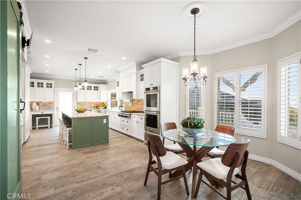 Dining room, Interior, Kitchen, Pendant Lights, Recessed Lighting, Stainless Steel Appliances, Wood Texture Flooring