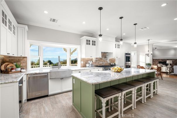 Dining room, Interior, Kitchen, Pendant Lights, Recessed Lighting, Stainless Steel Appliances, Wood Texture Flooring