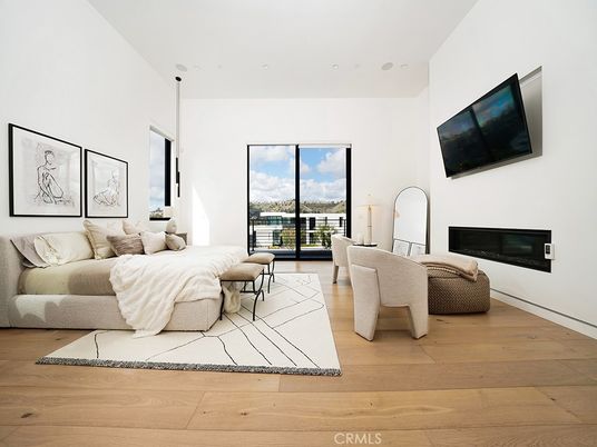 Bedroom, Fireplace, Interior, Pendant Lights, Recessed Lighting, Water, Wood Texture Flooring