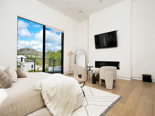 Bedroom, Fireplace, Interior, Recessed Lighting, Wood Texture Flooring